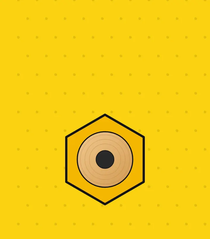 End view of a six-sided yellow pencil showing the ring of wood and the dark graphite core inside
