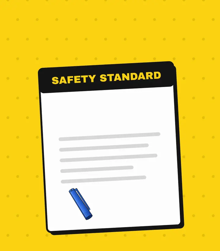 Illustrated document headed 'Safety standard' with lines of text and a small blue pen cap drawn in the corner